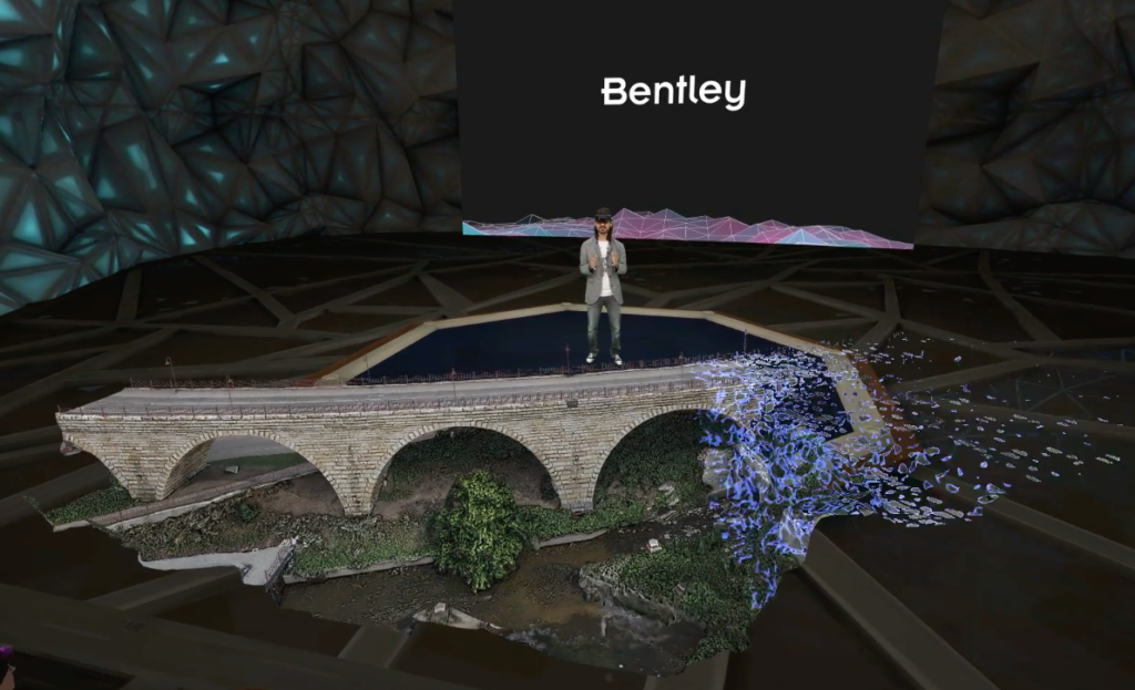 Video screenshot from Ignite keynote shows a lifelike bridge rendered in front of the presenter.